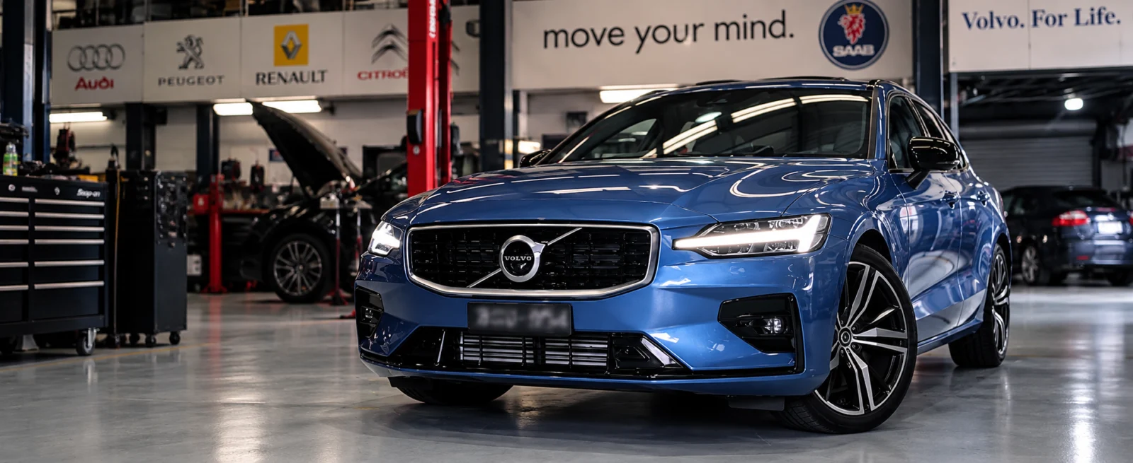 European Car Service Workshop – Melbourne European Blue Volvo inside the Melbourne European workshop in Oakleigh